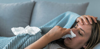 (C) iStock by Getty Images: Die Symptome sind bekannt, aber nur wenige lassen sich gegen die Grippe impfen.