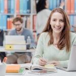 University student reading a textbook