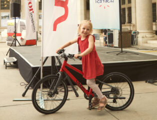 Beim Kinderlesefest woom-Bike für Ferienstart gewinnen!