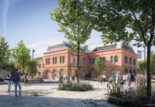 Alte Werkshalle wird zum neuen Bürostandort Die ehemalige Werkstätte wird bis Ende März 2028 zum modernen Bürostandort © ZOOMVP Hinterwirth
